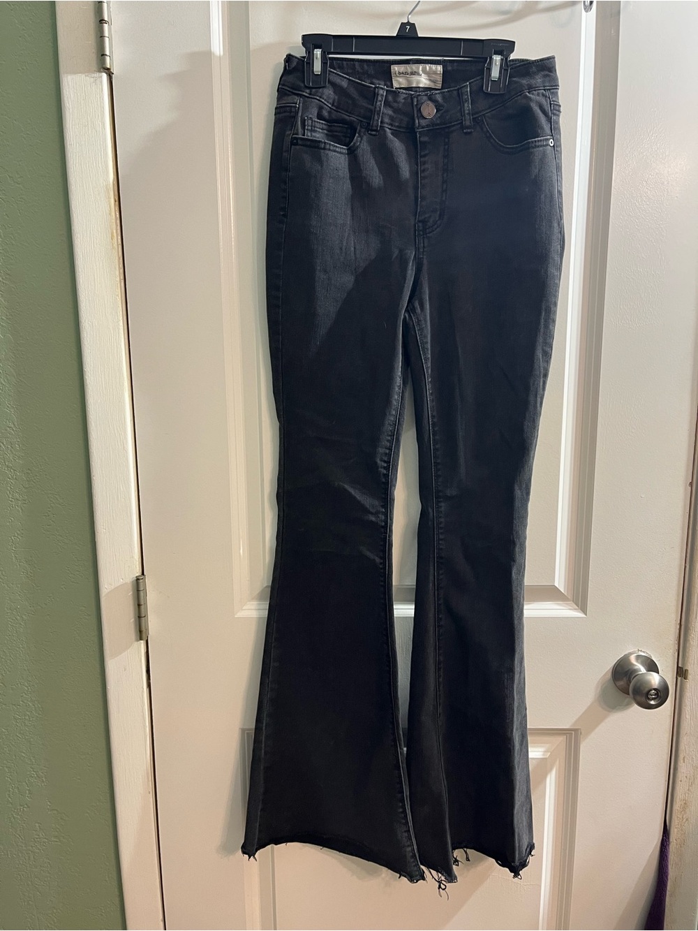 Black High-Rise Flared Jeans with Raw Hem